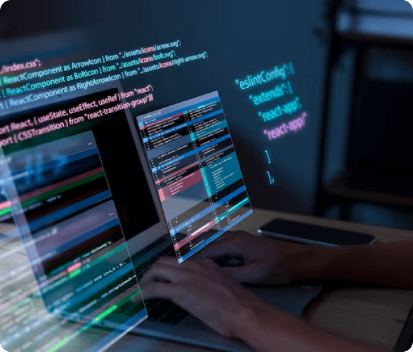 An individual working on a laptop, with a screen filled with code, illustrating a programming task in progress.